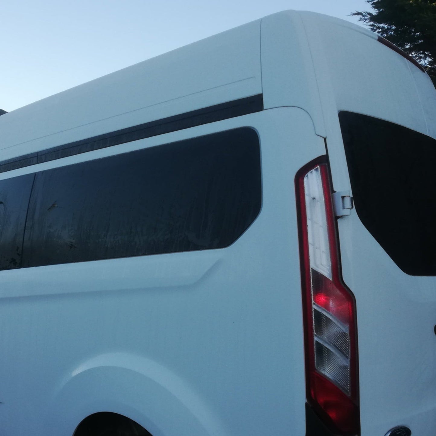Transit custom rear quarter window, privacy tint, available for SWB and LWB as well as 100% blackout windows
