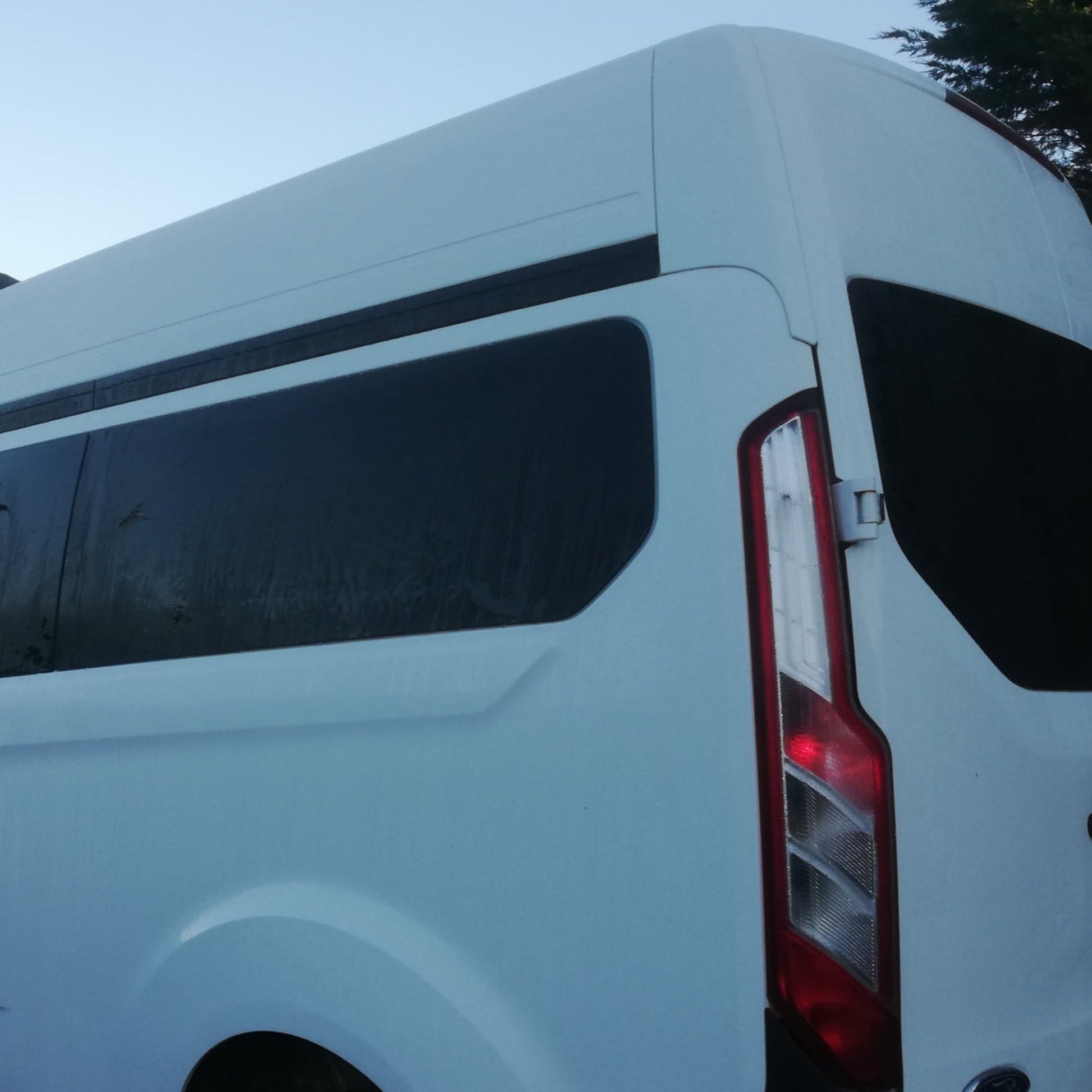 Transit custom rear quarter window, privacy tint, available for SWB and LWB as well as 100% blackout windows