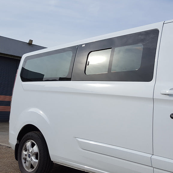 Transit custom with sliding window clear green tin